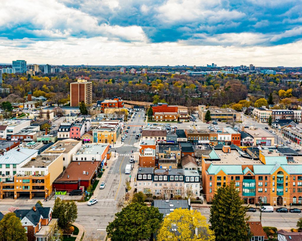 Downtown Oakville featuring a mix of buildings and shops, capturing the vibrant atmosphere of the area.